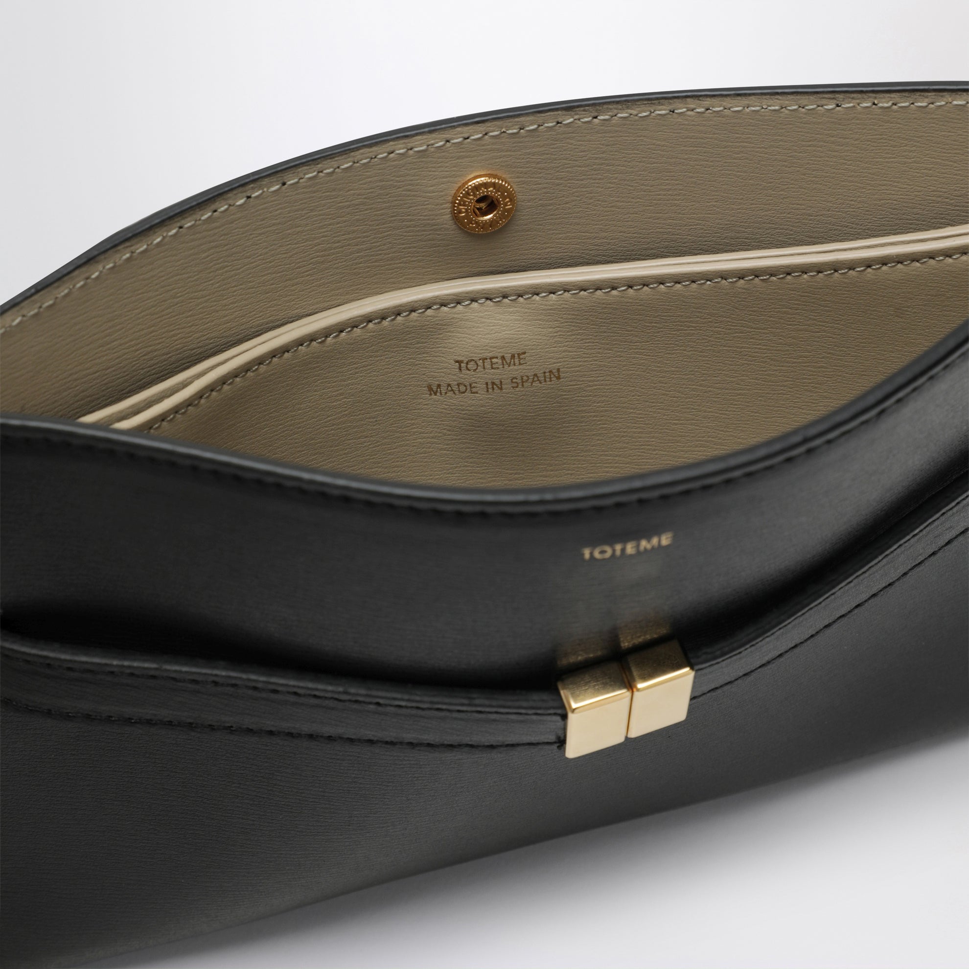 Borsa a tracolla con cintura in pelle palmellata nera