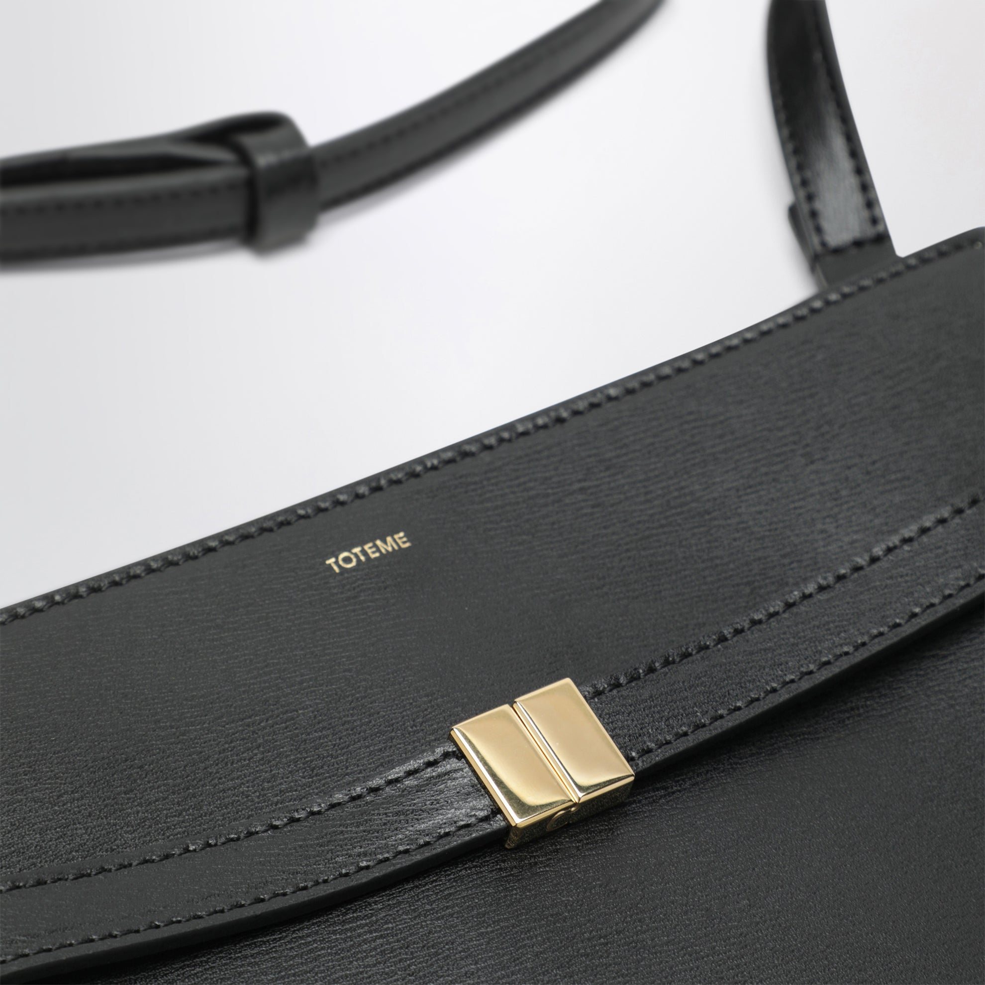 Borsa a tracolla con cintura in pelle palmellata nera