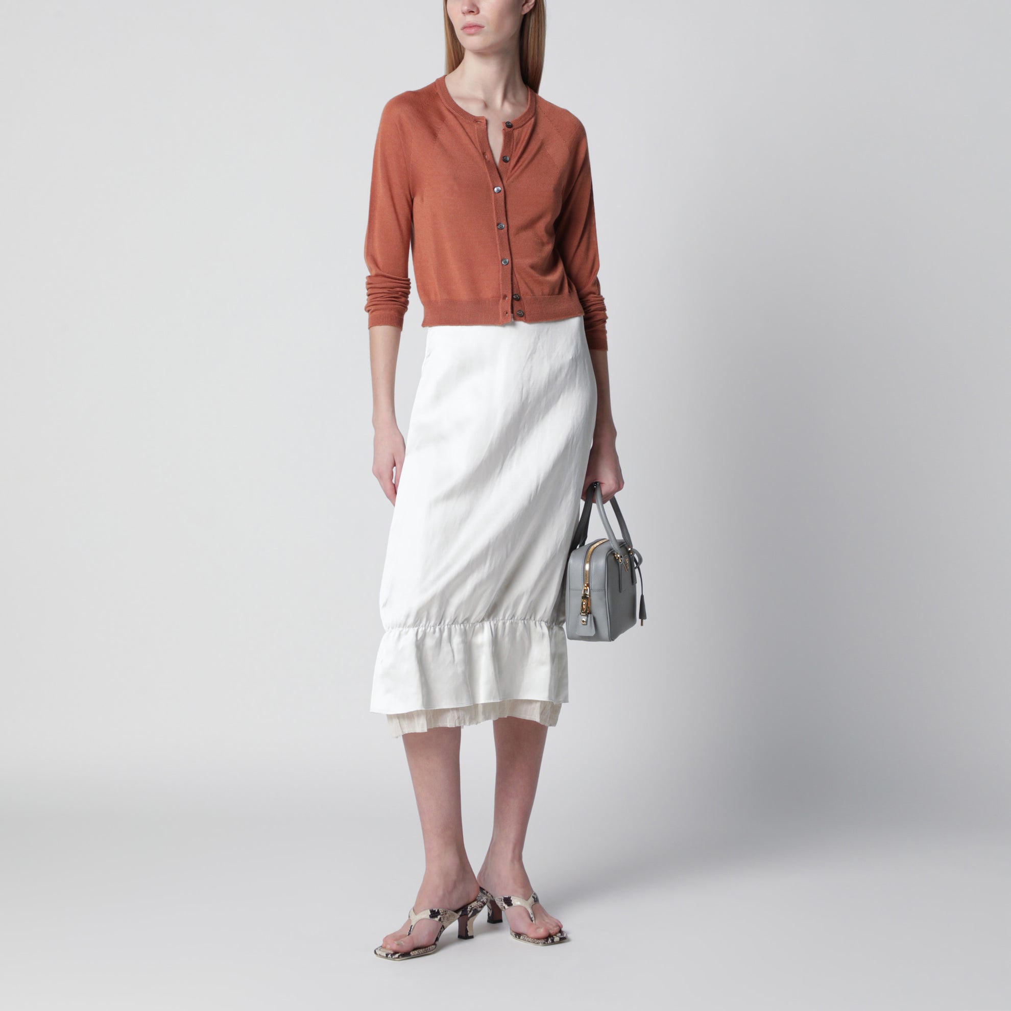 Cardigan color mattone in cashmere e seta