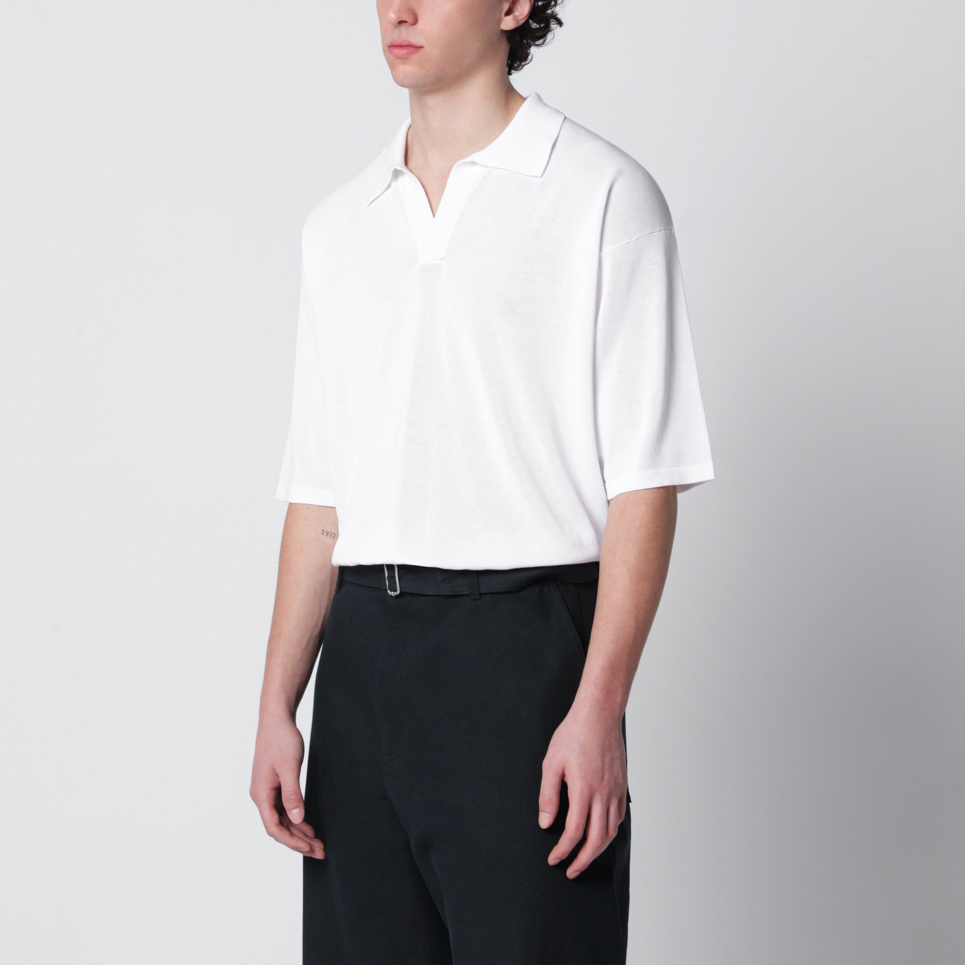 Weißes Polo aus Baumwollstrick