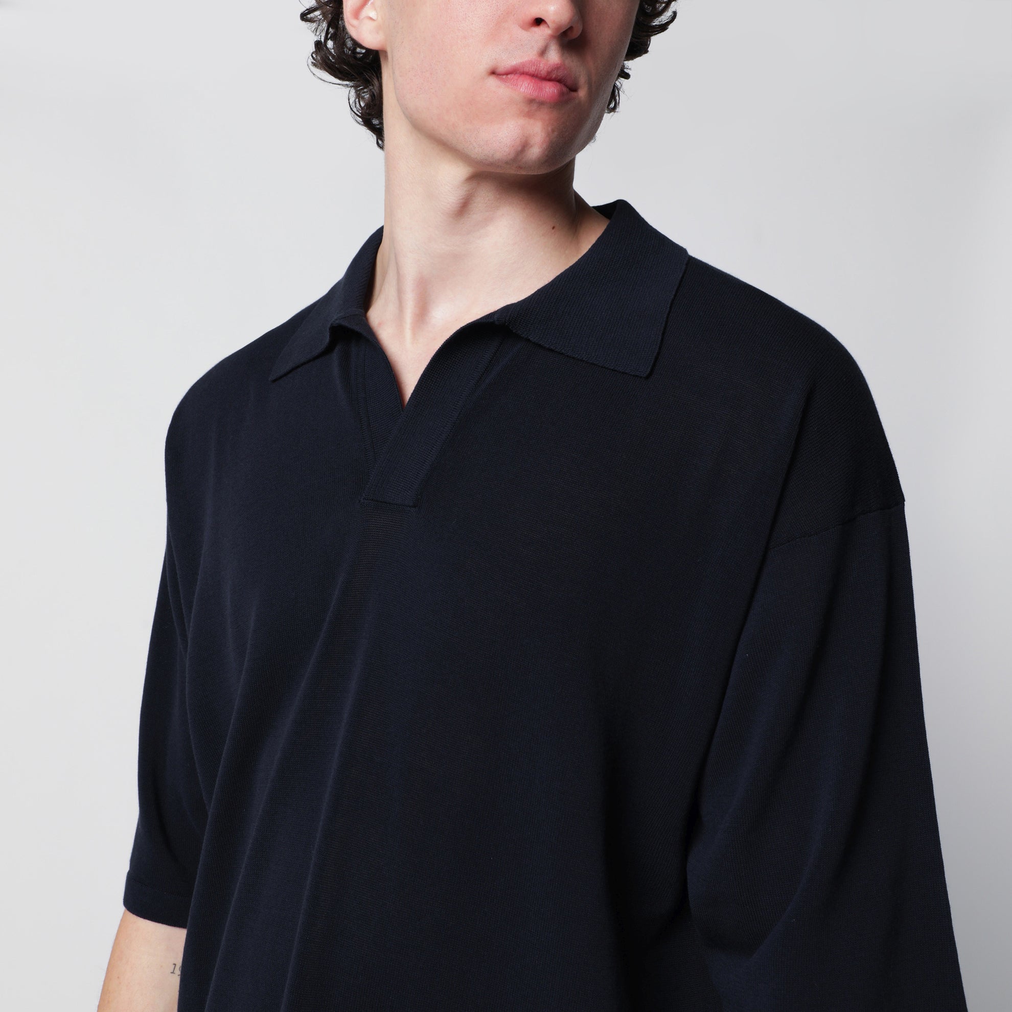 Navy blue cotton knit polo shirt