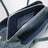 La Passeggiata Small washed denim top handle bag