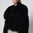 Cropped Bomberjacke aus schwarzem Curly-Shearling-Lammfell