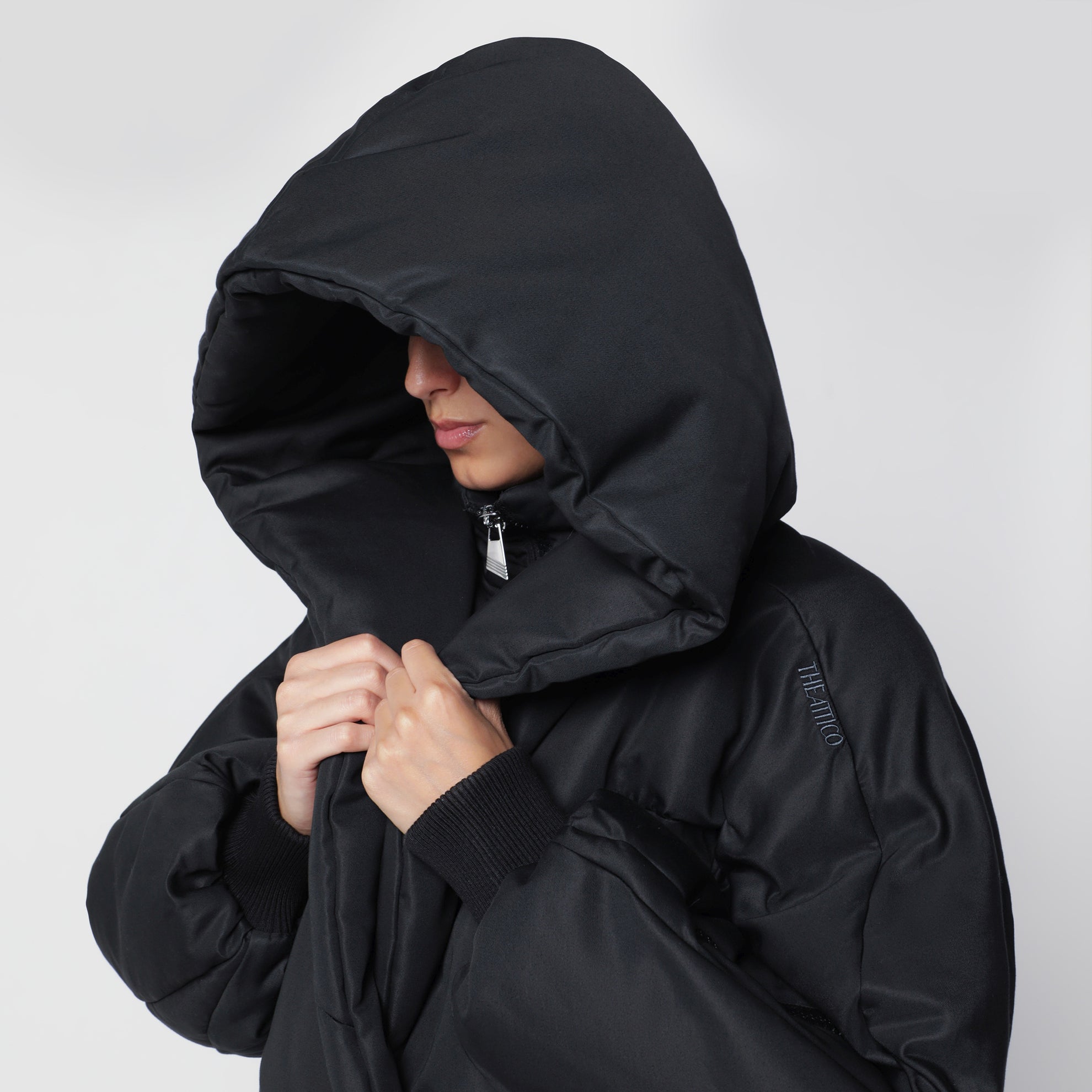 Black quilted cotton-blend puffer jacket