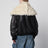 Bomber in pelle nero con collo in shearling