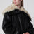 Bomber in pelle nero con collo in shearling