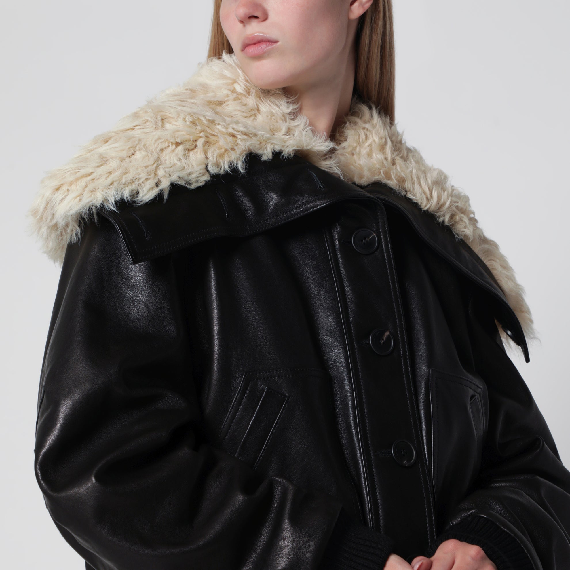 Bomber in pelle nero con collo in shearling