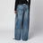 Jean wide-leg bleu et noir à double taille