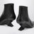 Bottines Cheope à talon compensé en cuir noir