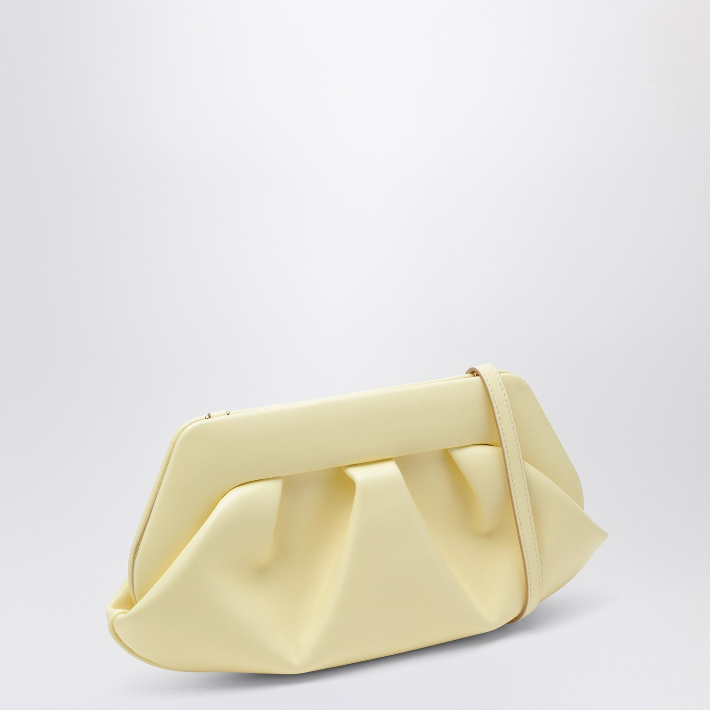 Emera clutch in pastel yellow