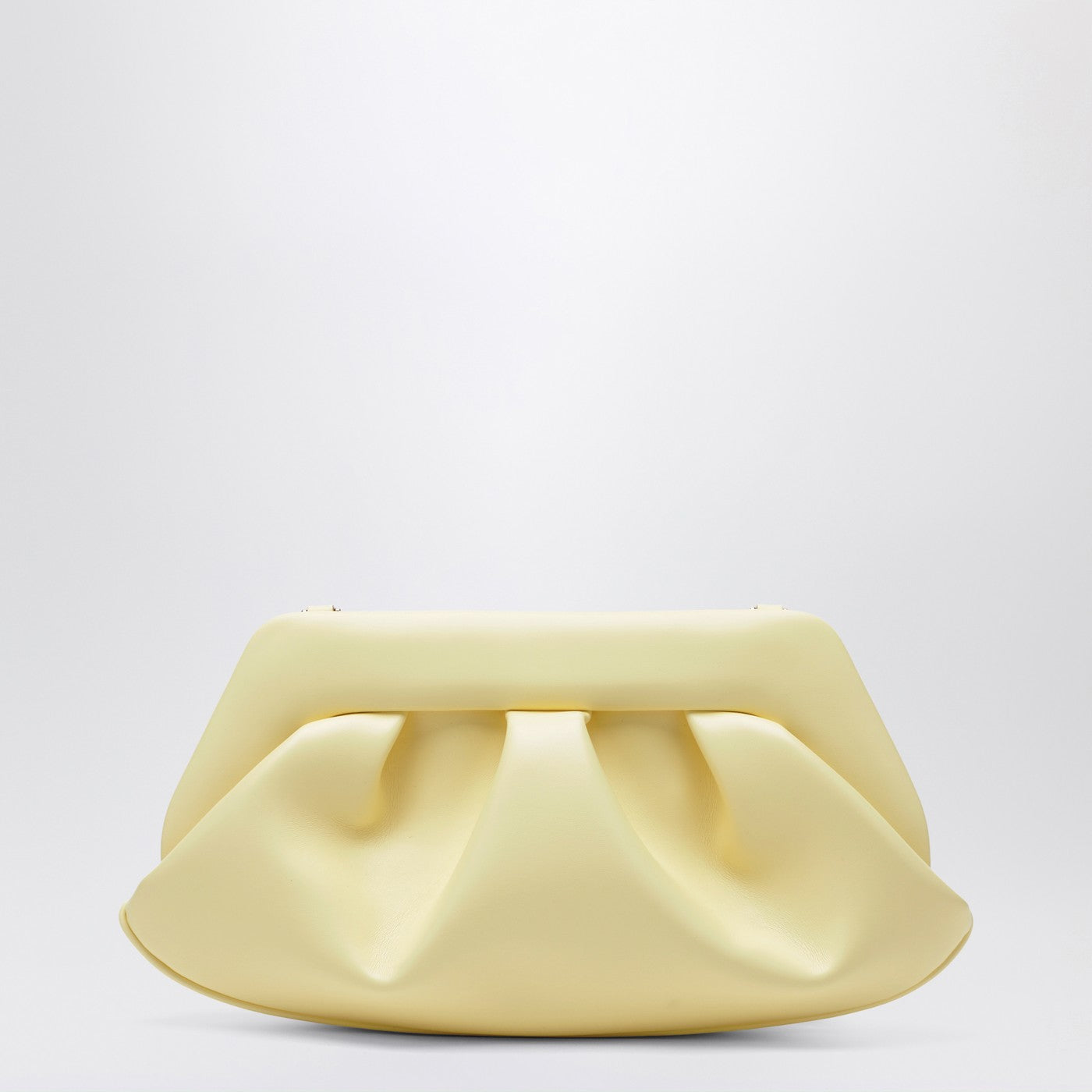 Emera clutch in pastel yellow
