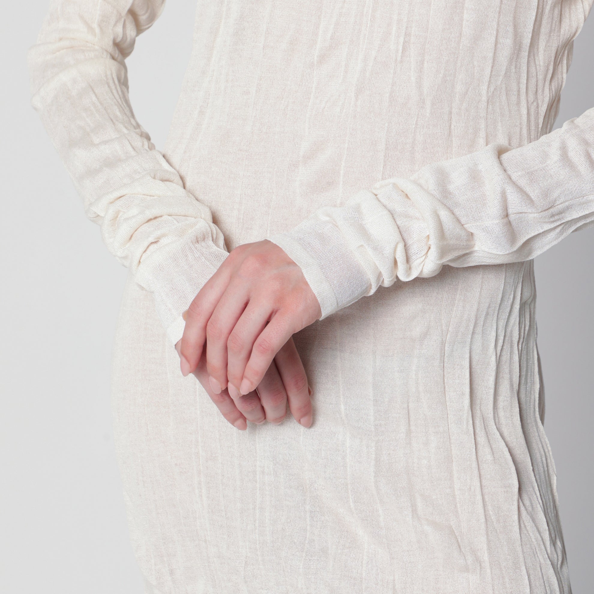 Robe abricot clair en maille froissée