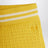 Short jaune en maille torsadée
