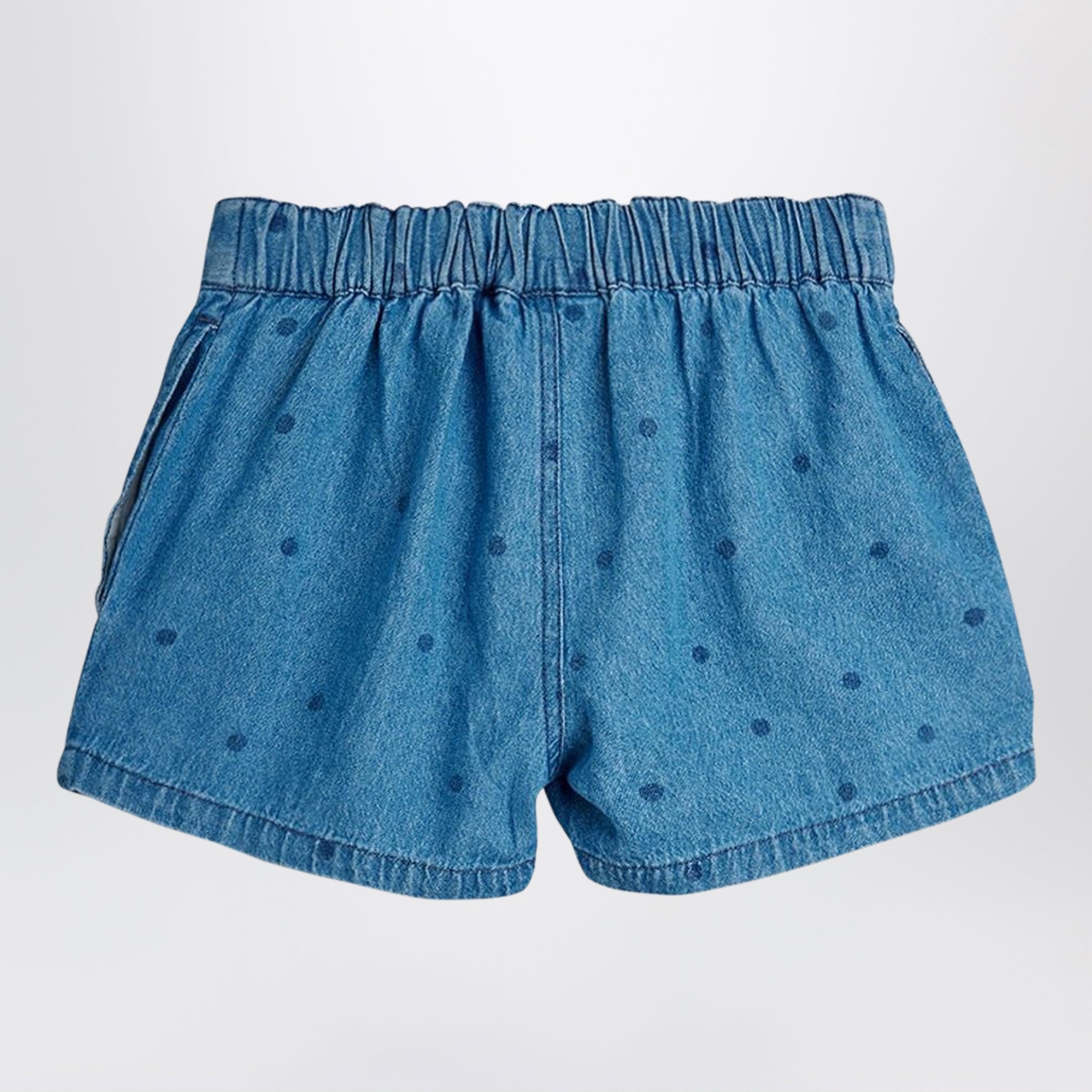 Blue denim shorts with polka dots