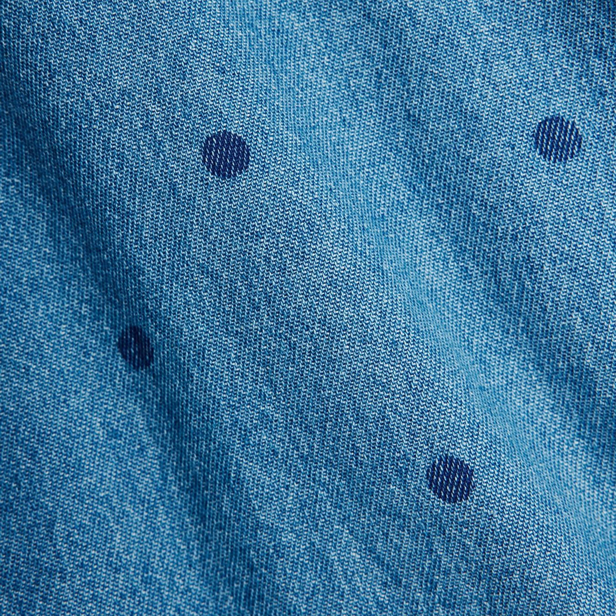 Blue denim shorts with polka dots