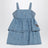 Robe bleue en denim à pois