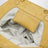 Pochette Bios gialla in ecopelle effetto suede intrecciata