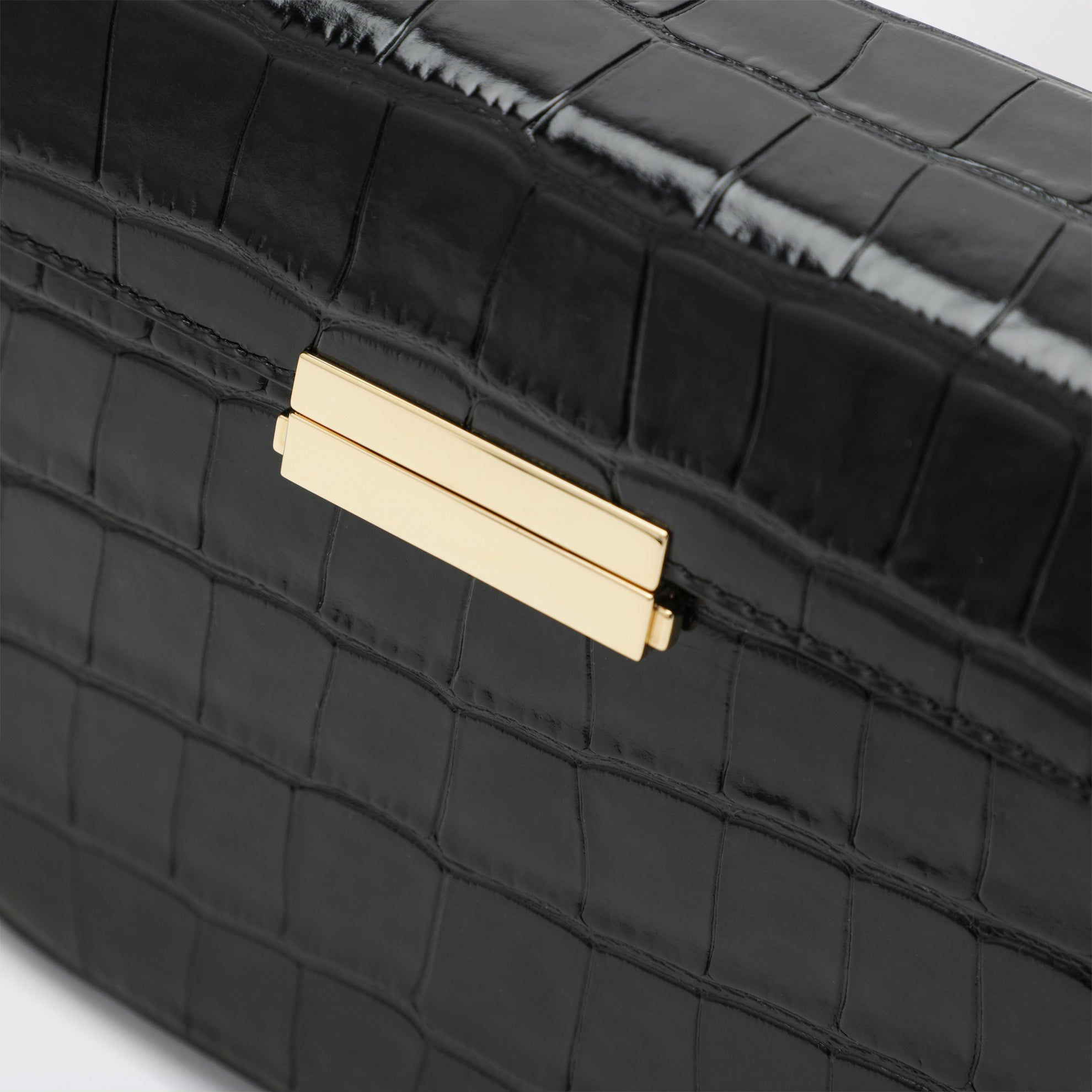 Clip croc-embossed leather shoulder bag in black