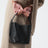 Kleine schwarze Belted Tote Bag aus genarbtem Leder