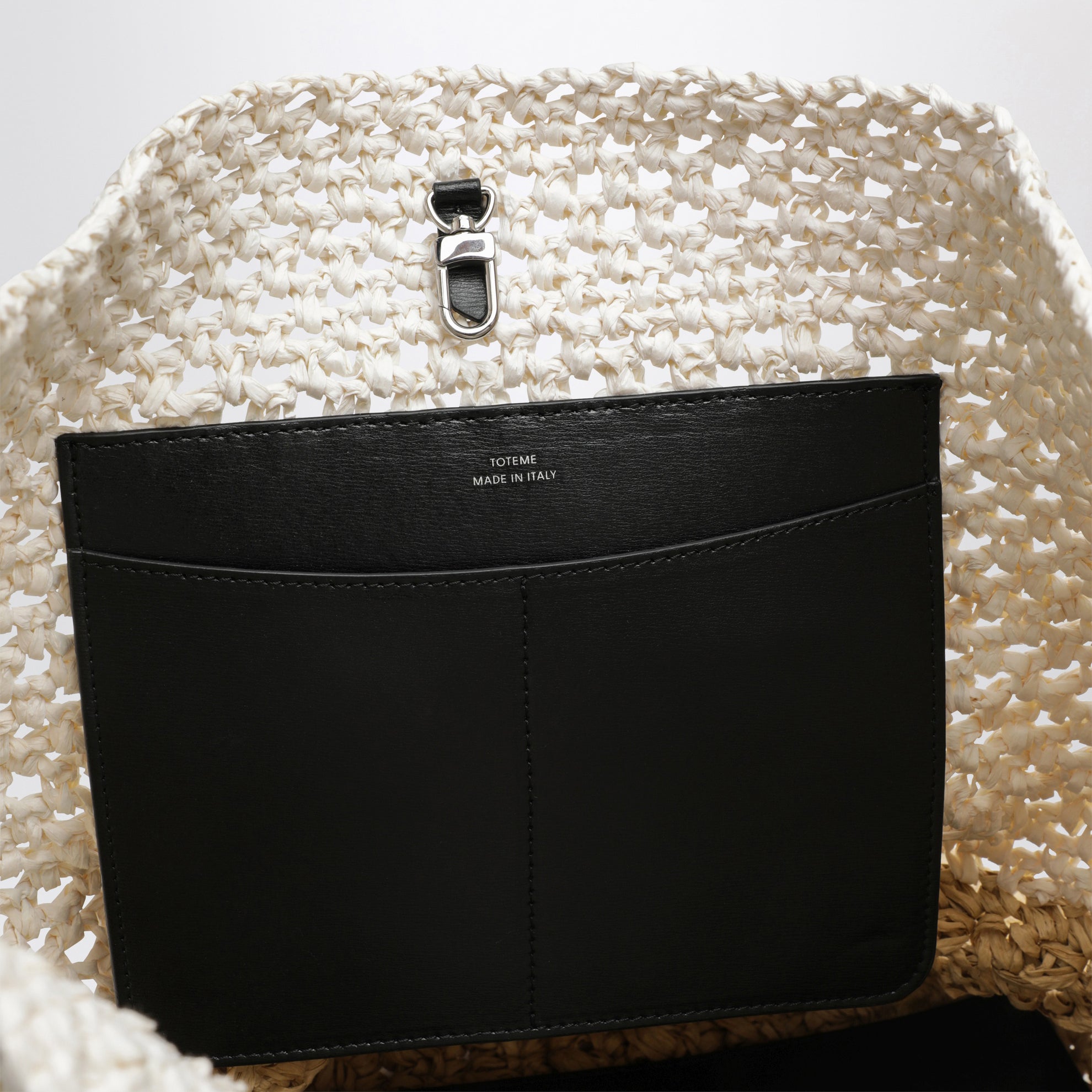 Tote bag with belt detail in écru raffia