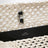 Tote bag with belt detail in écru raffia