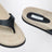 Beige/black lizard-effect leather flip-flops