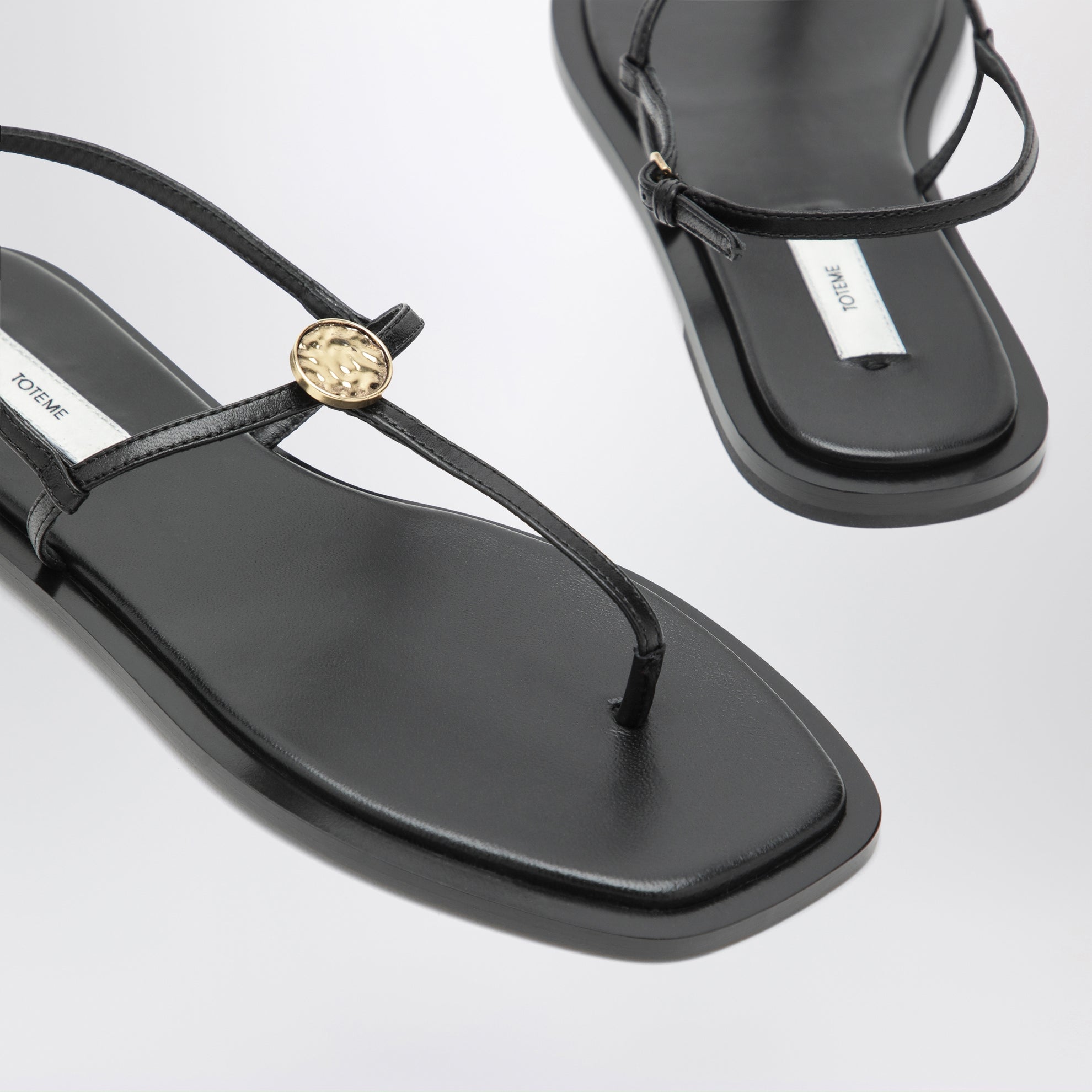 Black nappa T-strap sandals