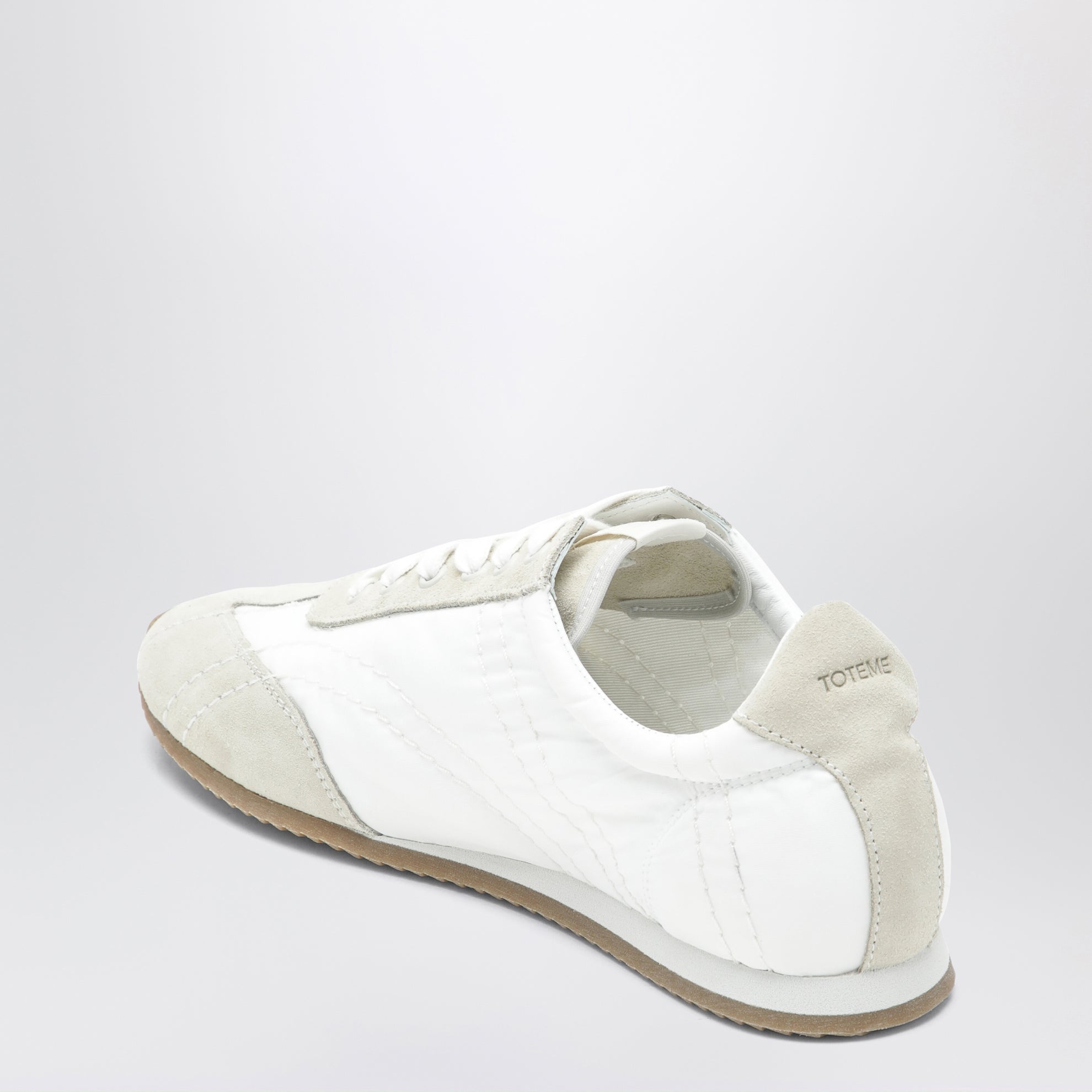 White and grey sport sneakers