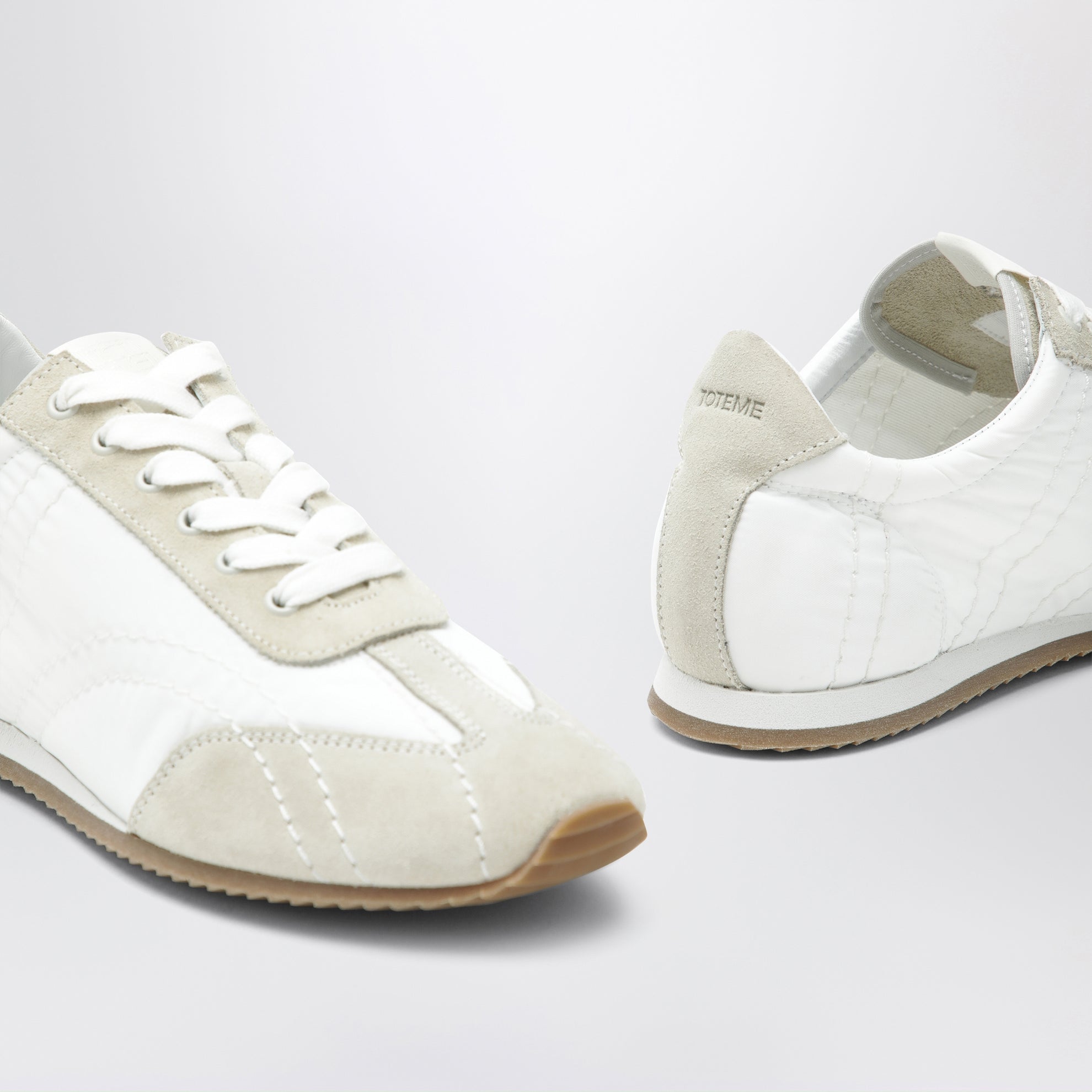 White and grey sport sneakers