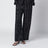 Pantaloni neri in seta con monogramma