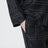 Pantaloni neri in seta con monogramma
