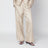 Pantaloni avorio in seta con monogramma