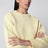 Oversize-Pullover mit Rundhalsausschnitt aus cremefarbener Baumwolle