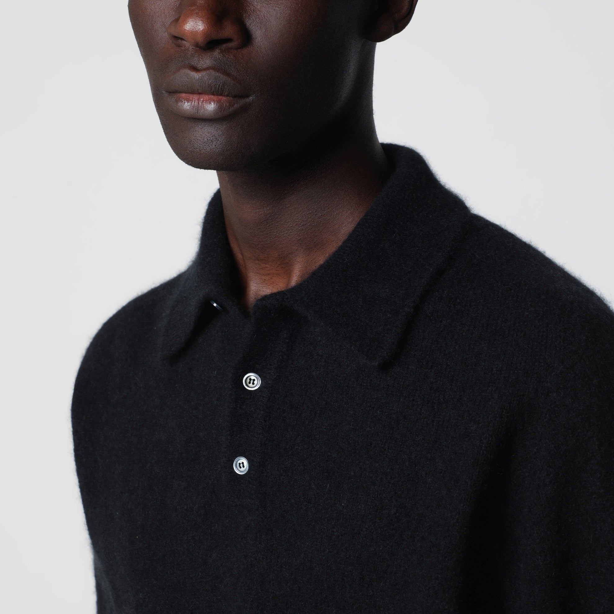Polo nera in cashmere