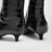 Bottines noires en cuir effet crocodile