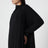 Abito asimmetrico stile foulard nero in jersey