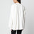 Ecrufarbene, asymmetrisch drapierte Bluse aus Viskose