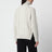 Ecru cable-knit wool turtleneck