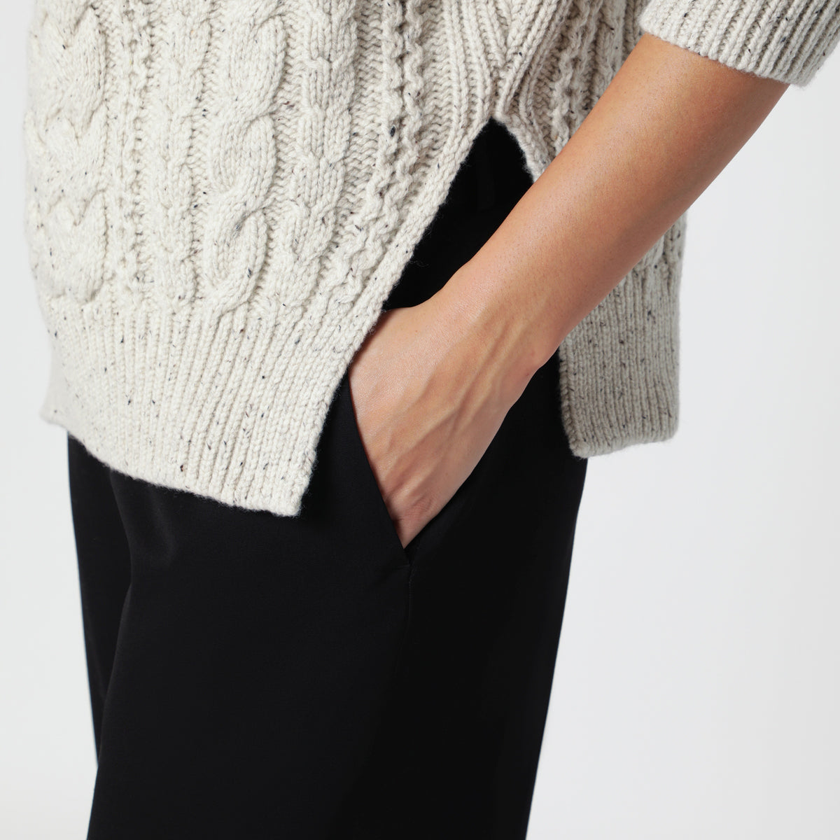 Ecru cable-knit wool turtleneck