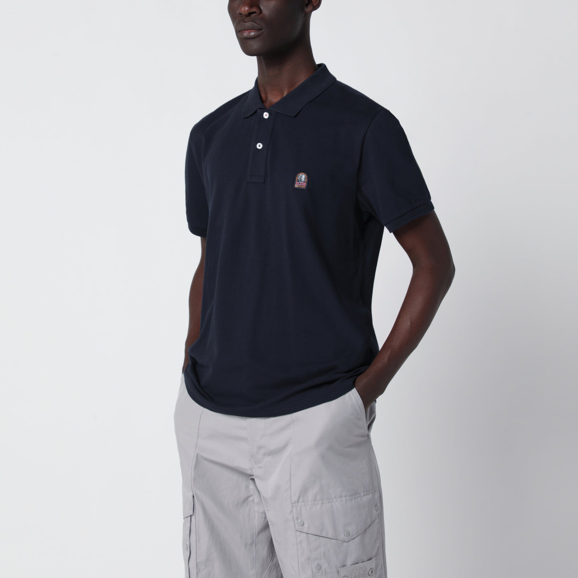 Polo bleu marine avec patch logo