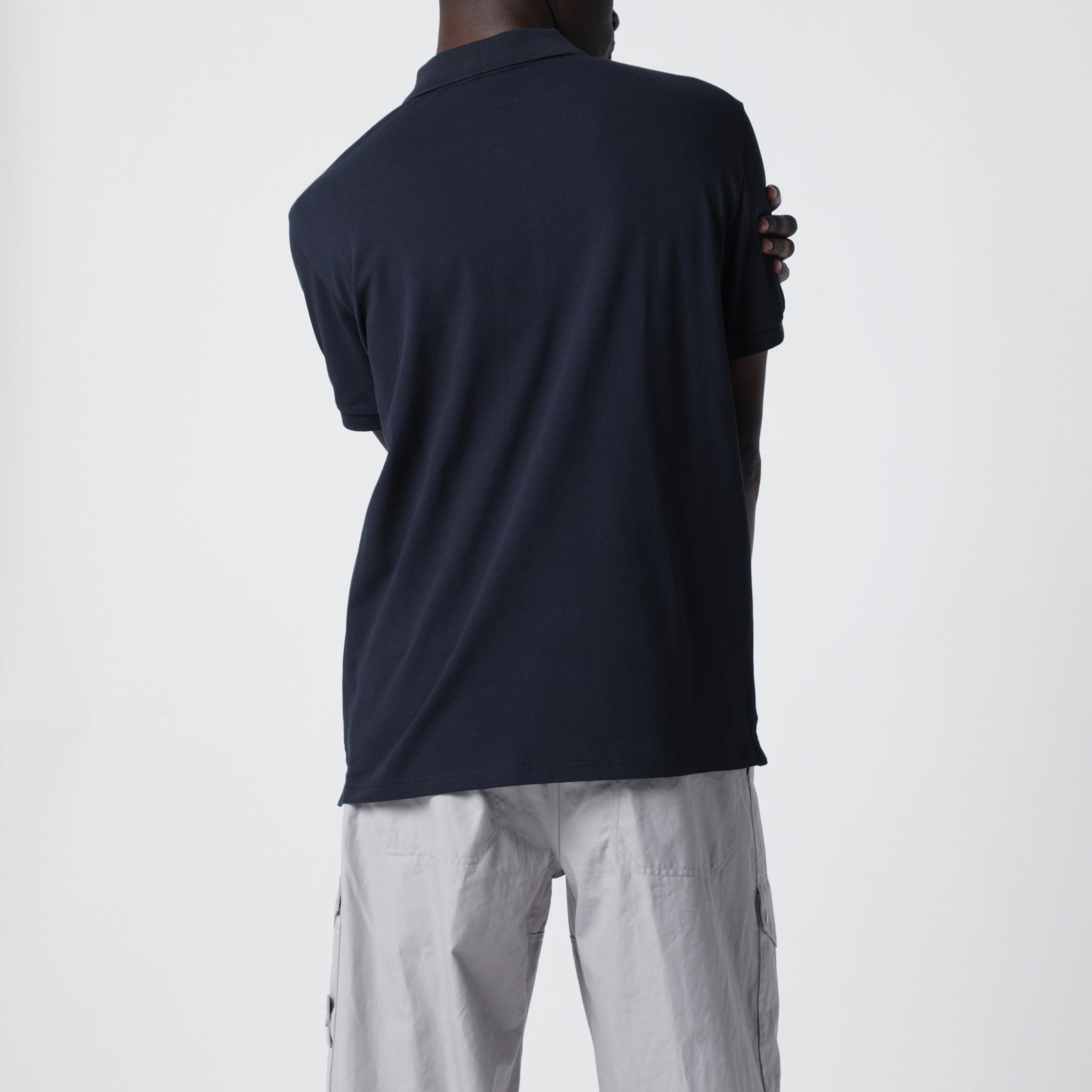 Polo bleu marine avec patch logo