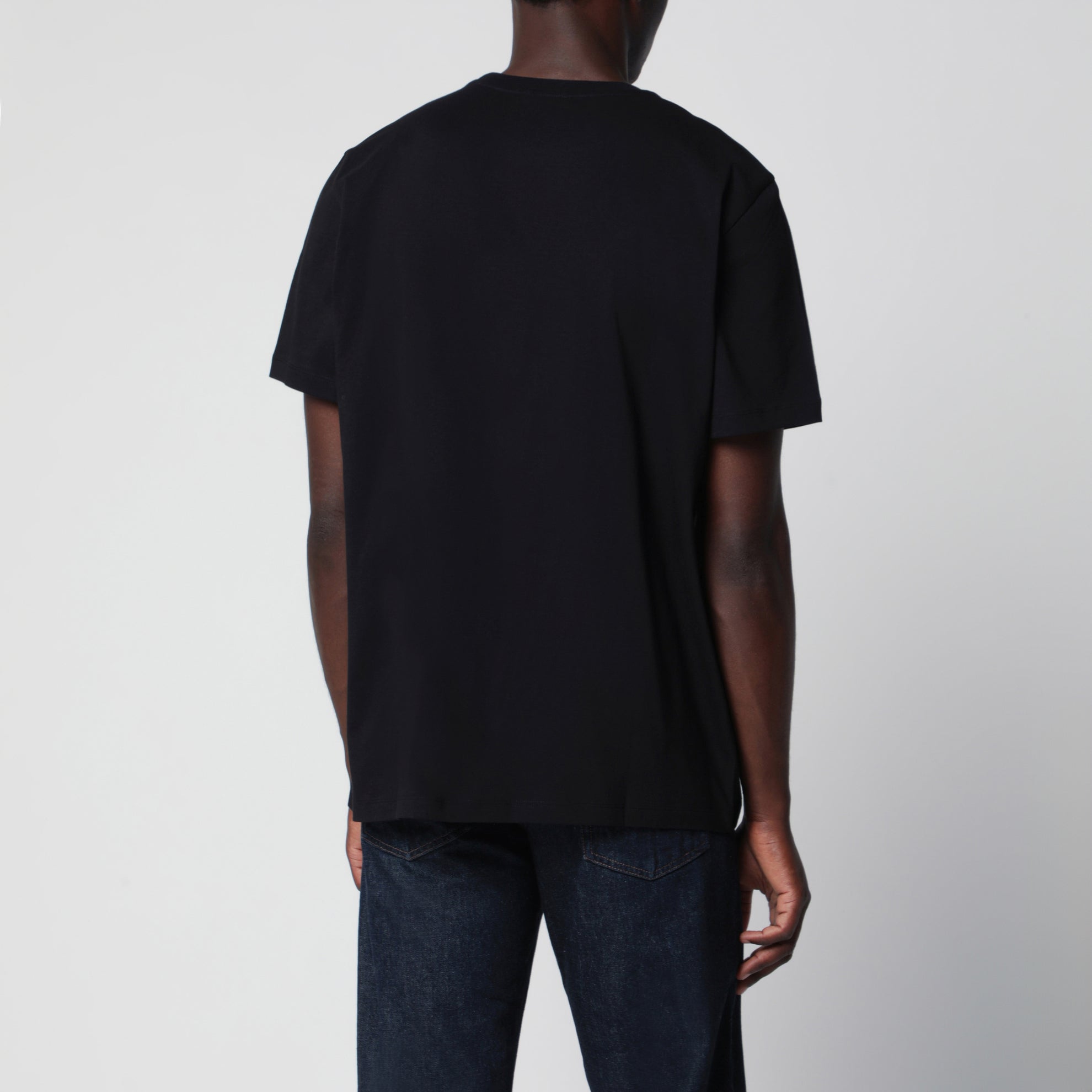 T-shirt nera in cotone con patch logo