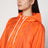 Orange raincoat in lightweight Re-Nylon