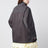 Lead-colored washed Re-Nylon raincoat