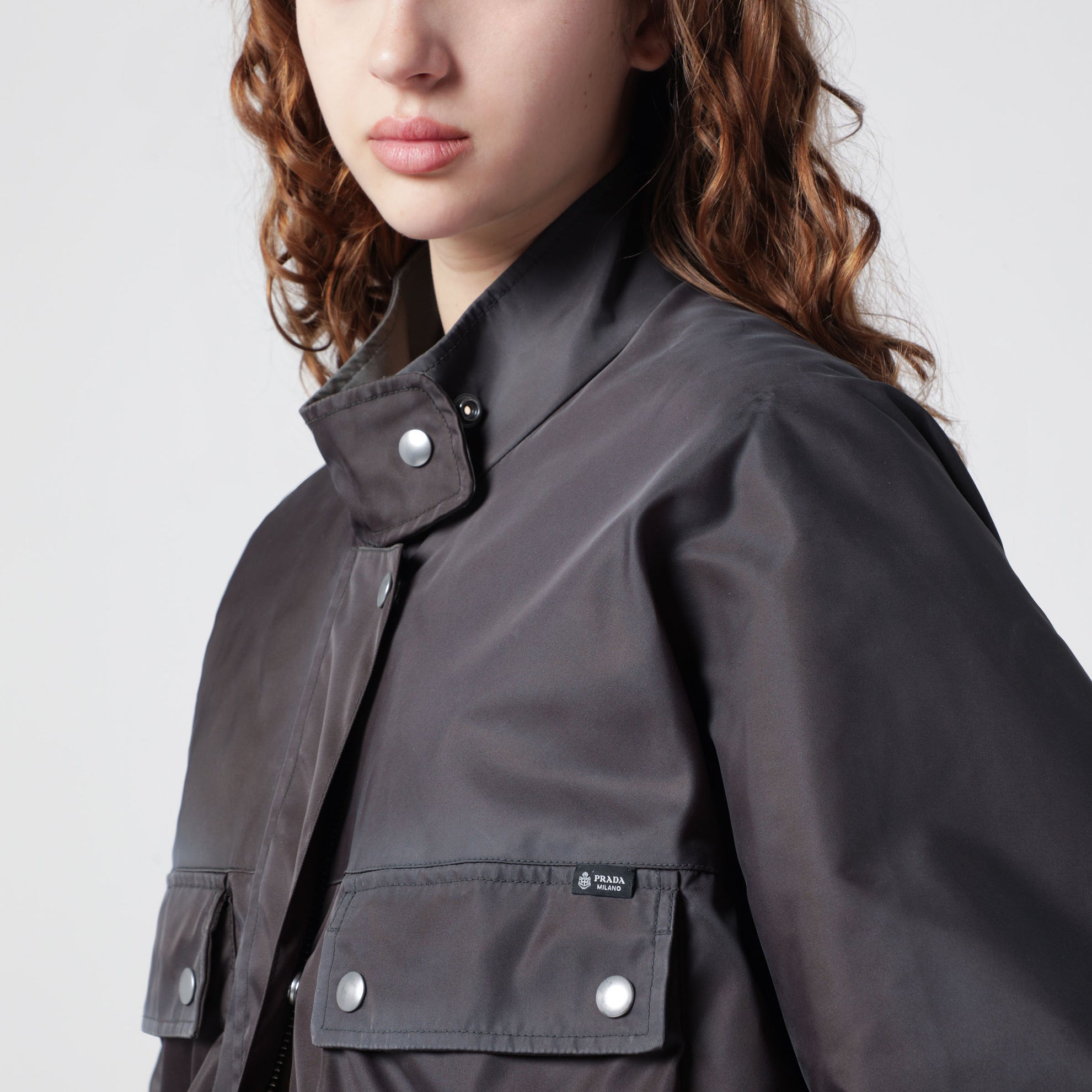 Lead-colored washed Re-Nylon raincoat