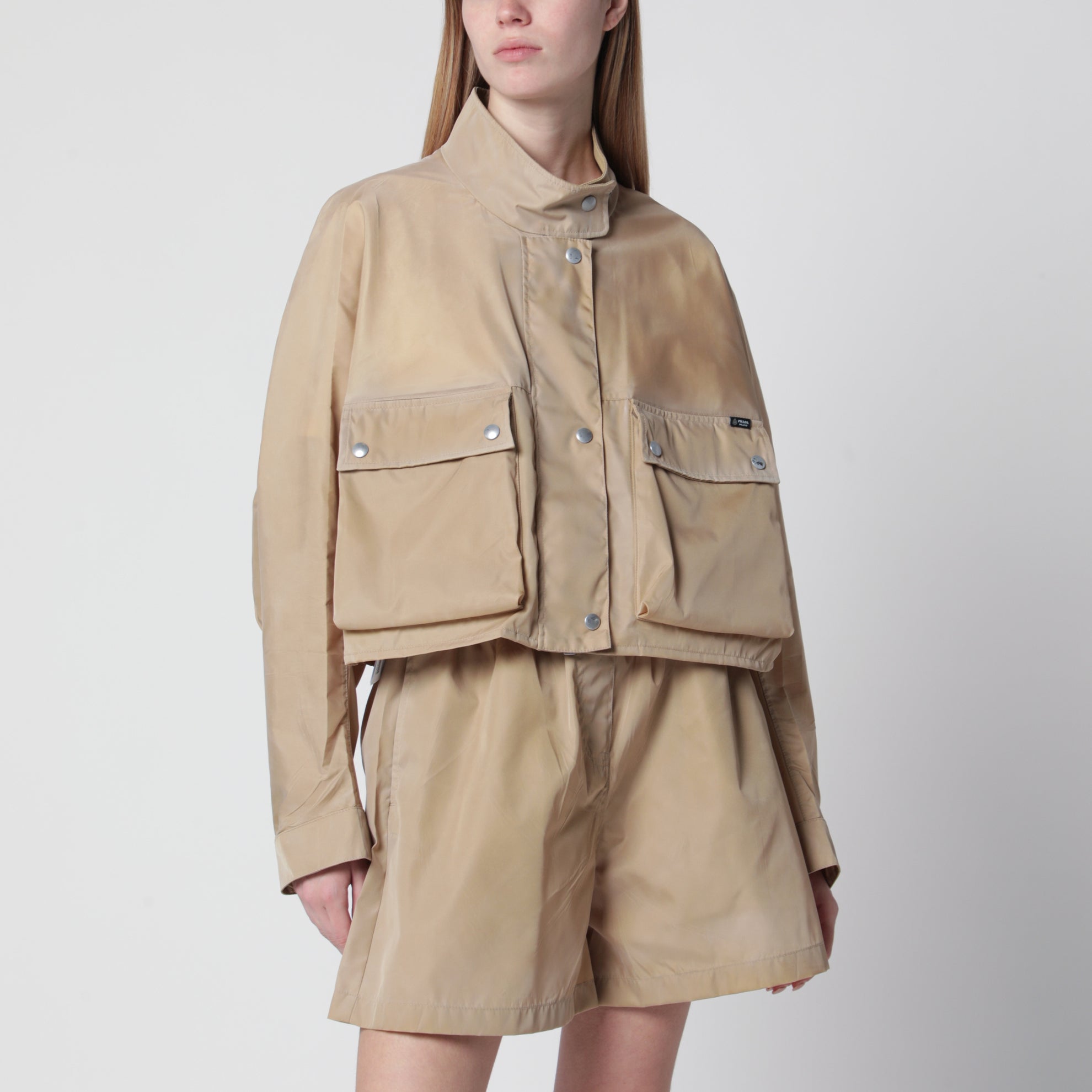 Short Re-Nylon raincoat in camel