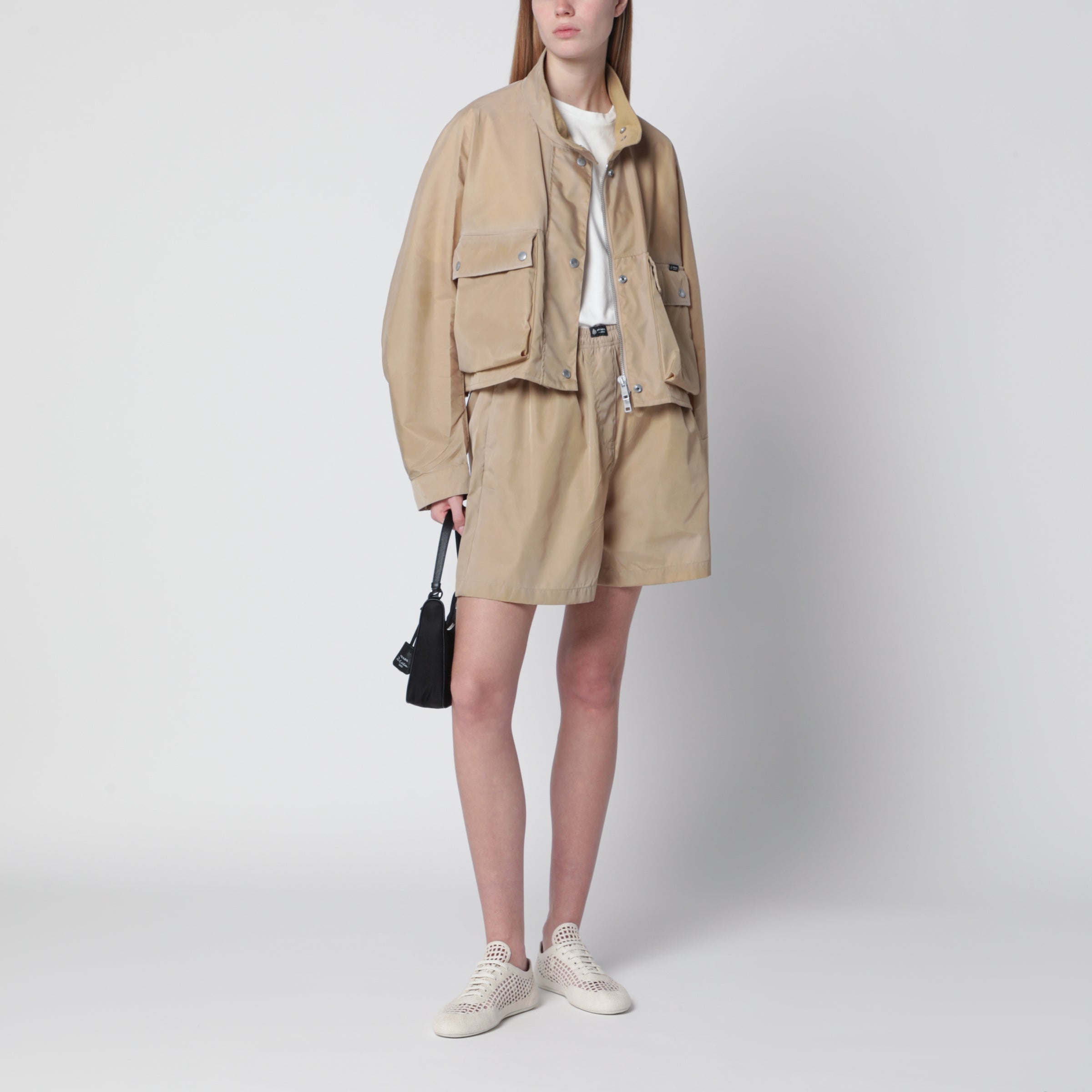 Prada Short Re-Nylon raincoat in camel | TheDoubleF