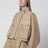 Short Re-Nylon raincoat in camel