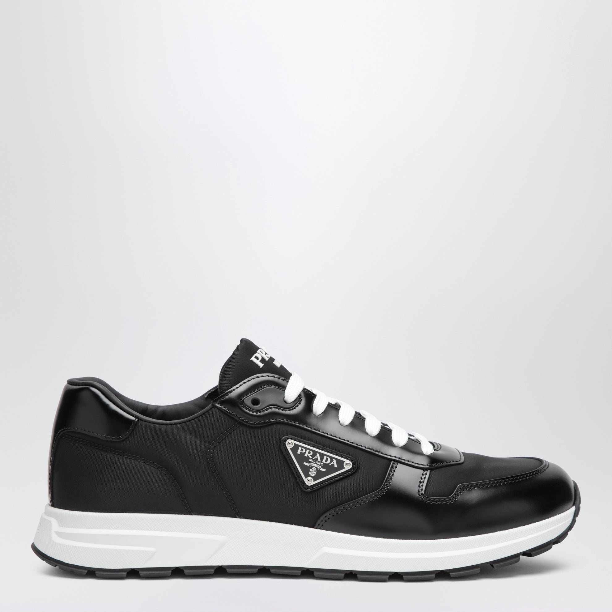 Prax 01 sneakers in black Re-Nylon and brushed leather