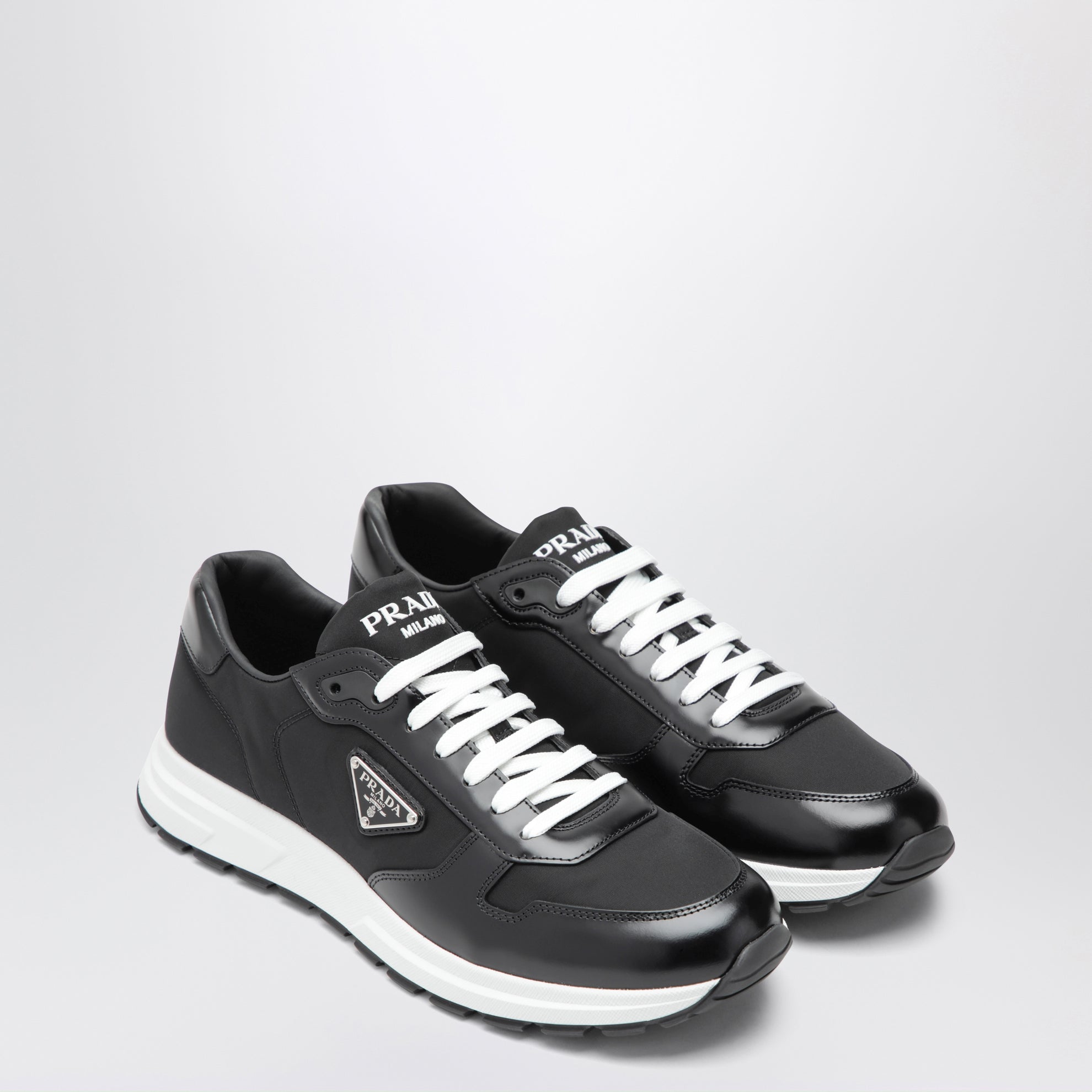 Prax 01 sneakers in black Re-Nylon and brushed leather